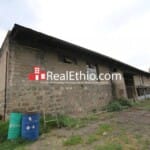 Mekanisa, 13,000 meter square land and 2,800 meter square warehouses for sale, Addis Ababa.